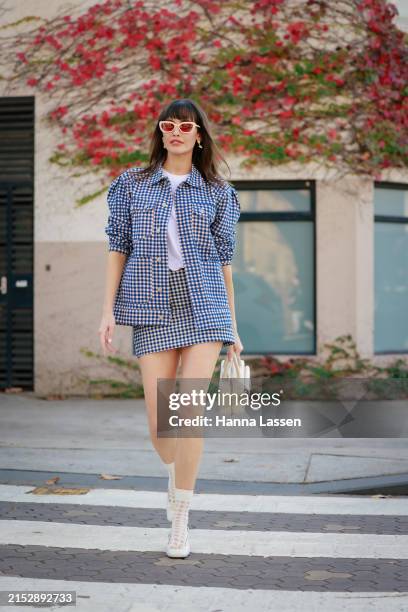 Sarah Stephens wearing Emma Mulholland jacket and mini skirt, white bag and shoes during Australian Fashion Week Presented By Pandora 2024 at...