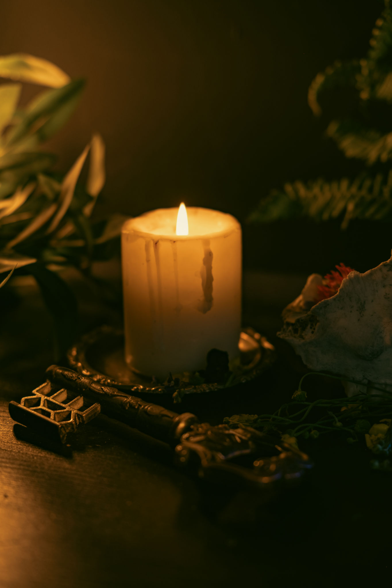 Magical ritual with a candle and an old key. Magical ritual with a candle and an old key.