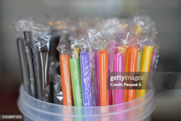 plastic straws - plastic straw stock pictures, royalty-free photos & images