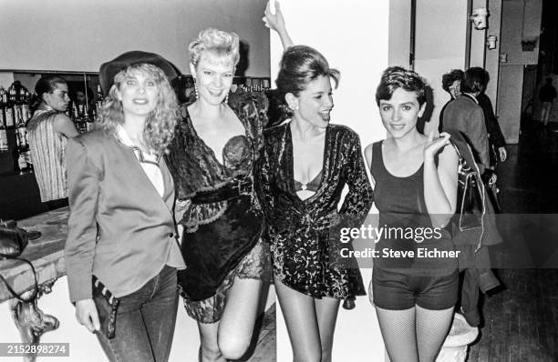 Portrait of 'Club Kid' Jane Thor , American actor Lisa Gaye , and publicist Kelly Cutrone , with an unidentified guest at the Palace de Beaute...