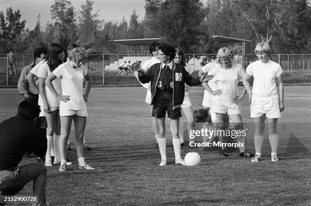Members of the England women's football team with coach Pat Dunn at a training session in Mexico City during the Women's World Cup in Mexico, 18th...