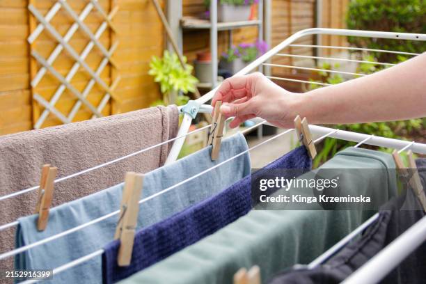 drying clothes outdoors - trocknen stock-fotos und bilder