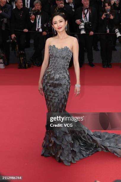 Actress Tong Liya attends the opening ceremony red carpet during the 77th Annual Cannes Film Festival at Palais des Festivals on May 14, 2024 in...