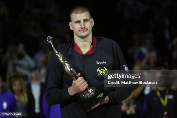 Nikola Jokic of the Denver Nuggets poses with the Michael Jordan MVP trophy prior to Game Five of the Western Conference Second Round Playoffs...