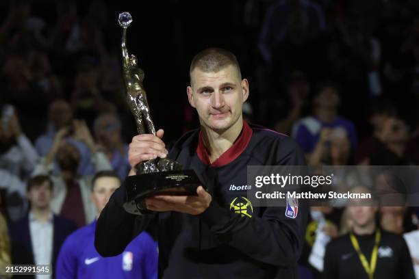 Nikola Jokic of the Denver Nuggets poses with the Michael Jordan MVP trophy prior to Game Five of the Western Conference Second Round Playoffs...