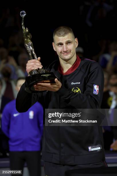 Nikola Jokic of the Denver Nuggets poses with the Michael Jordan MVP trophy prior to Game Five of the Western Conference Second Round Playoffs...