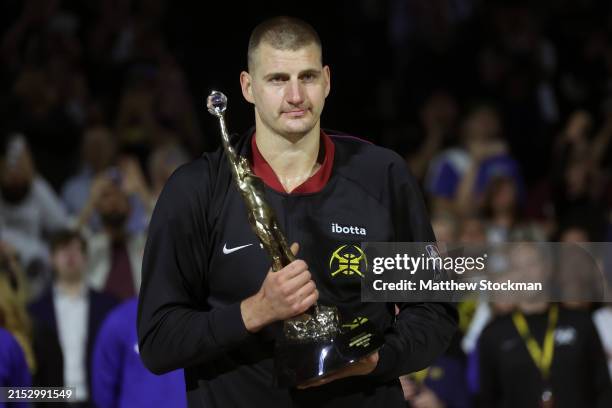 Nikola Jokic of the Denver Nuggets poses with the Michael Jordan MVP trophy prior to Game Five of the Western Conference Second Round Playoffs...