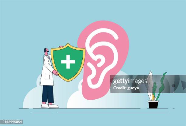 male doctor, blue cross shield, ear icon. male doctor holding shield to protect ears. - earlobe stock illustrations
