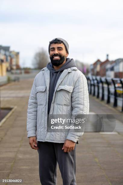 portrait of a handsome pakistani gentleman - warm clothing stock pictures, royalty-free photos & images