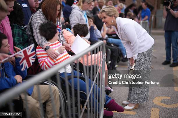 Sophie, Duchess Of Edinburgh greets staff, students and guests during a visit to The Seashell Trust on May 15, 2024 in Cheadle, Greater Manchester....