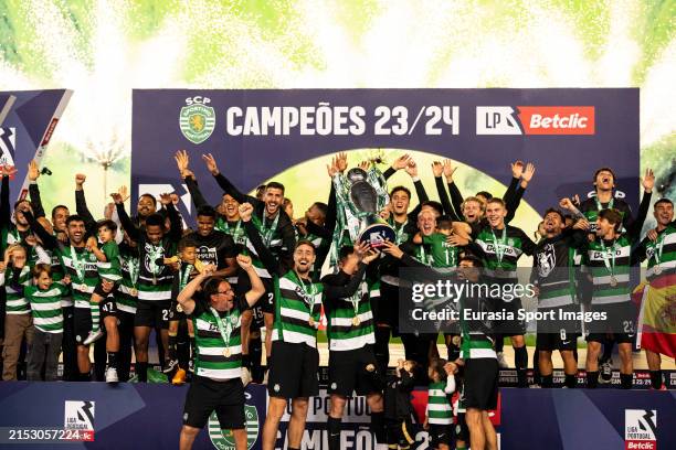 Sporting CP squad raises the Portuguese Liga winners trophy during the Liga Portugal Bwin match between Sporting CP and GD Chaves at Estadio Jose...
