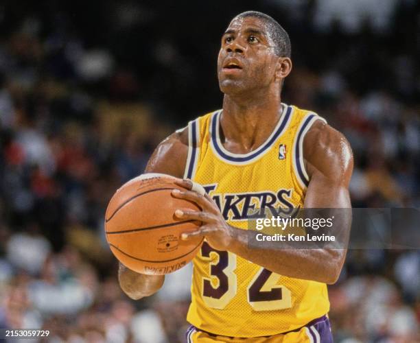 Earvin Magic Johnson, Shooting Guard and Power Forward for the Los Angeles Lakers prepares to shoot a free throw during the NBA Pacific Division...