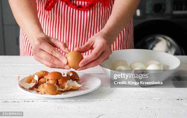 peeling eggs - peeling off stock pictures, royalty-free photos & images