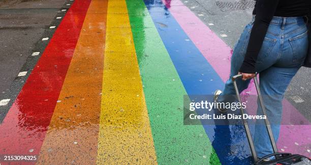 walking on a rainbow pedestrian crossing - camden lock market stock pictures, royalty-free photos & images
