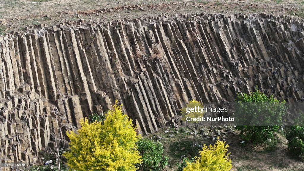 A volcanic rock column group is standing in Gulinaobao in Ulanqab ...