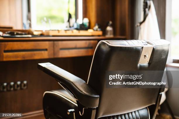 empty chair in barber shop. - workbench stock pictures, royalty-free photos & images