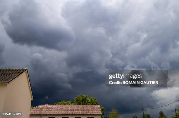 Thunderstorm over the roofs of houses in the small town of Chanteau near Orleans, in Chanteau, France, on 19May 2024.
