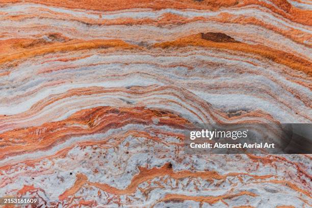 layers of rock photographed on cable beach, broome, western australia, australia - geschichtet stock-fotos und bilder