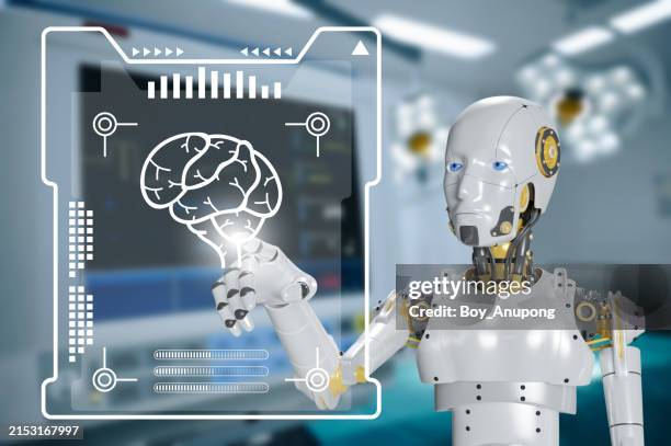artificial intelligence robot while analyzing patient data for helping brain surgery in operating room. - équipement technique médical photos et images de collection