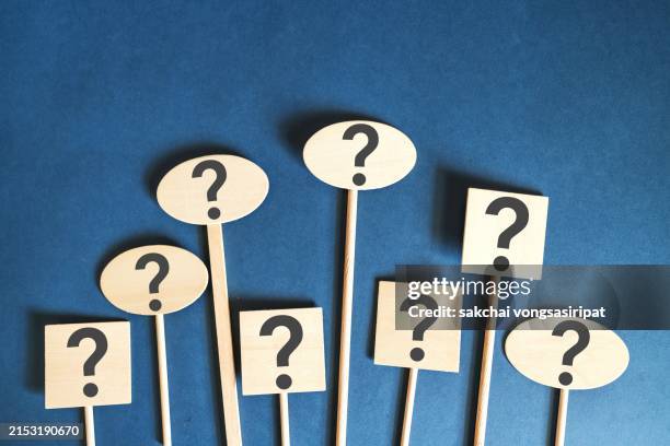 Closeup Of Question Mark Symbol On Wooden Sign High-Res Stock Photo ...