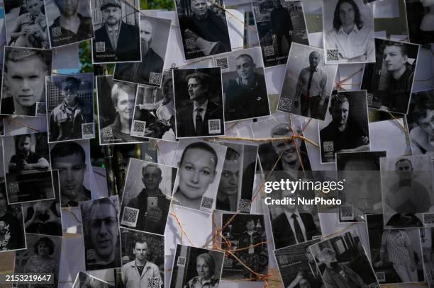 People are seen attending a demonstration in support of Belarusian prisoners of conscience in Warsaw, Poland on 18 May, 2024. As of May 2024 nearly...