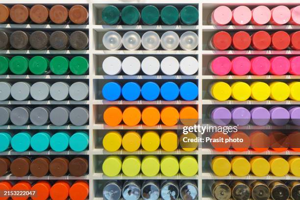 vibrant spray paint can shelf display - paint can shelf stock pictures, royalty-free photos & images