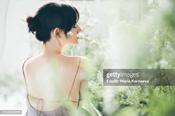 portrait of a woman in flowers. - beautiful magic woman stock pictures, royalty-free photos & images