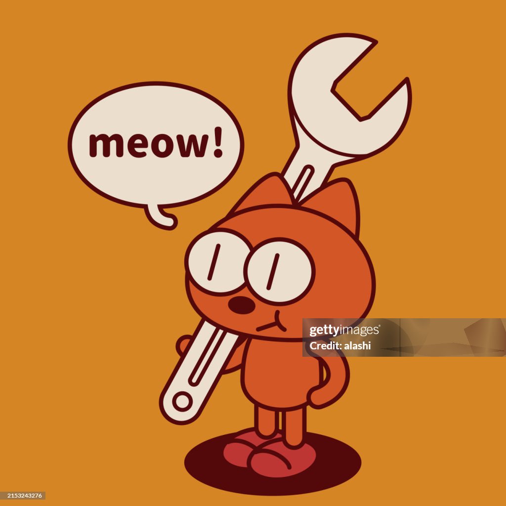 Un gattino eccentrico e carino che tiene una grossa chiave inglese