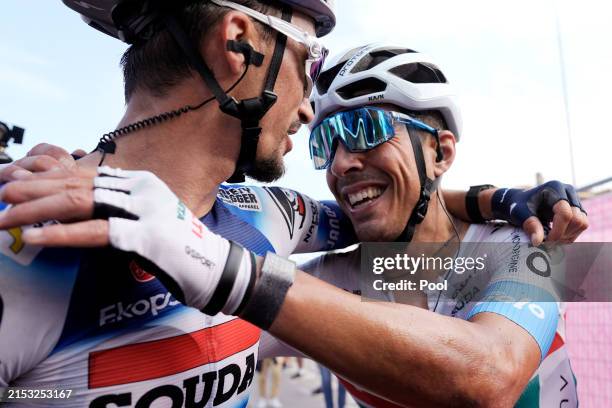 Stage winner Julian Alaphilippe of France and Team Soudal Quick-Step celebrates the victory with Mirco Maestri of Italy and Team Polti Kometa after...