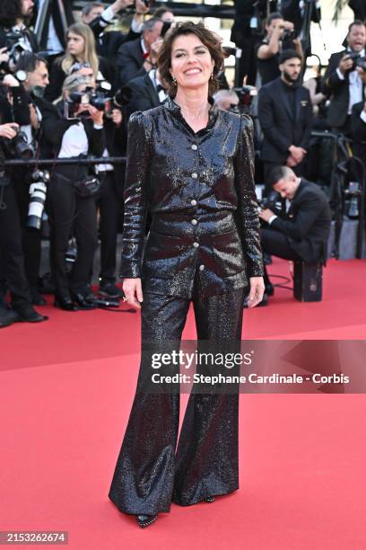 Irene Jacob attends the "Megalopolis" Red Carpet at the 77th annual Cannes Film Festival at Palais des Festivals on May 16, 2024 in Cannes, France.
