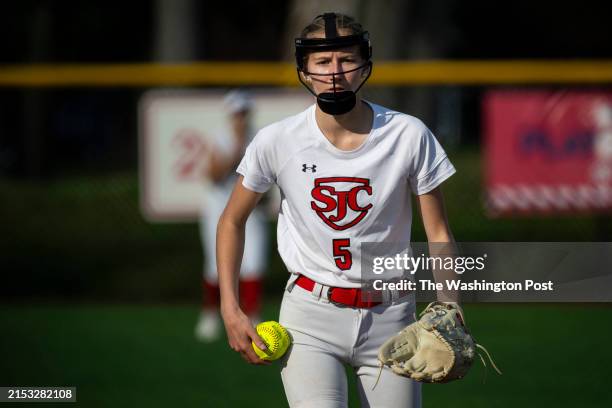 St. John's pitcher Charlotte Lacy prepares to pitch during an at bat, during the DCSAA 2024 Softball Championship game between St. John's College...