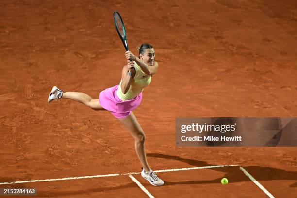 Aryna Sabalenka plays a backhand against Danielle Collins of United States during their Womens Singles Semi-Final match on Day Eleven of the...
