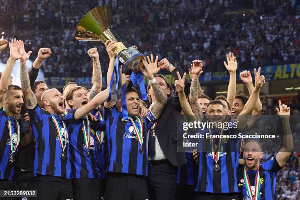 Lautaro Martinez of FC Internazionale lifts the trophy while FC Internazionale players celebrate winning the championship after during the Serie A...