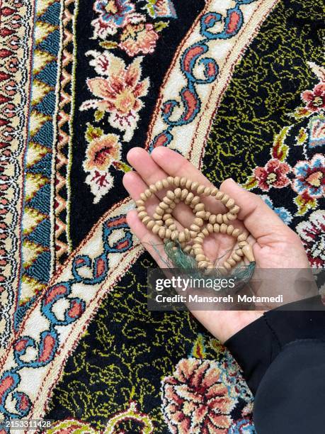 praying hand with tasbih - prayer beads stock pictures, royalty-free photos & images