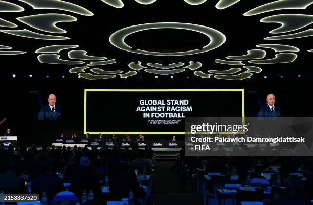 General view of LED graphics that read "Global stand against racism in Football" during the 74th FIFA Congress 2024 at the Queen Sirikit National...