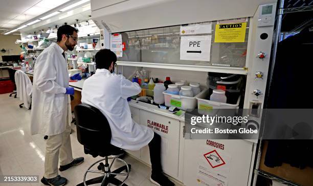 Cambridge, MA From left, Jon Arizti Sanz, PhD, Postdoctoral Fellow with Liam Alec Stenson Ortiz, research associate working in the lab. The Broad...
