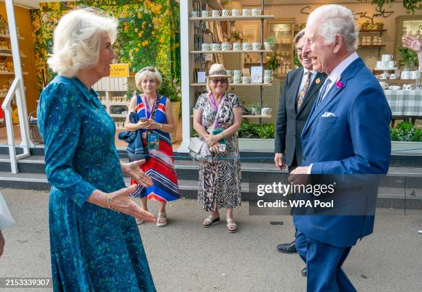 Britain's King Charles III and Britain's Queen Camilla visit the 2024 RHS Chelsea Flower Show on May 20, 2024 in London, England. The Chelsea flower...