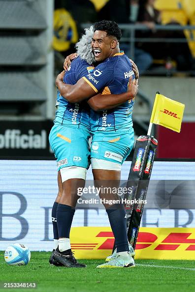 Fine Inisi of Moana Pasifika celebrates his try with Julian Savea ...