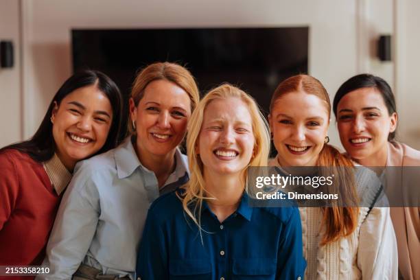 five businesswomen laughing at the camera - five people stock pictures, royalty-free photos & images