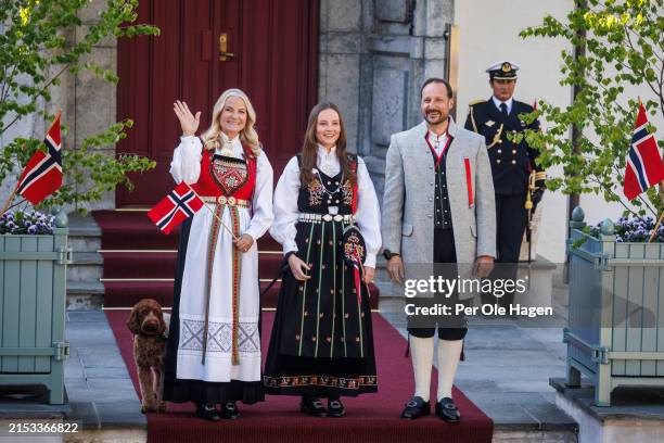 Crown Princess Mette Marit, Princess Ingrid Alexandra and Crown Prince Haakon Magnus greet the children's parade at their residence Skaugum in Asker,...