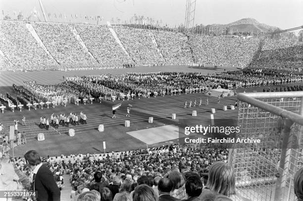 Athletes from the United States participate in the Parade of Nations at Olympiastadion during the opening ceremonies for the 20th Summer Olympic...