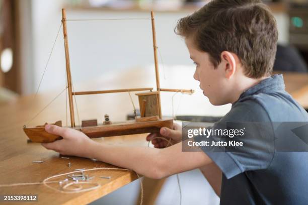 Boy Making Model Kit 3,072 Tween Boy Models Stock Photos, High-Res Pictures, and Images ...