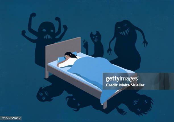 spooky shadows of monsters surrounding woman sleeping in bed at night - scary shadow stock illustrations