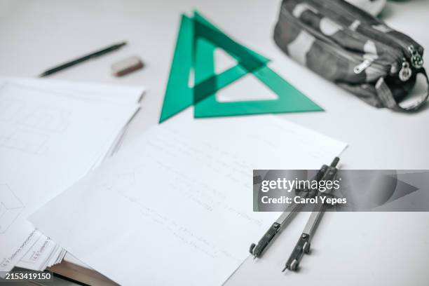 drawing compass, design sheets and rulers in student workplace.top view - mac desk stock pictures, royalty-free photos & images