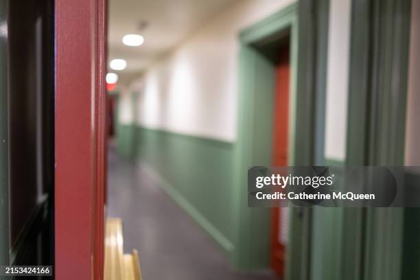 long corridor in student dormitory - university hallway stock pictures, royalty-free photos & images