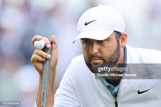 Scottie Scheffler of the United States lines up a putt on the fourth green during the second round of the 2024 PGA Championship at Valhalla Golf Club...