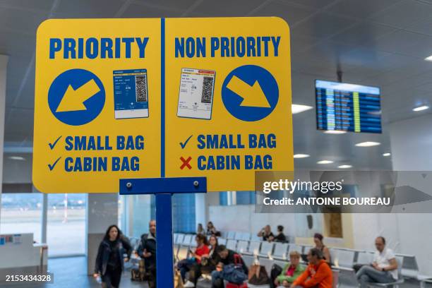 Sign separating priority passengers at boarding at Palermo airport in Sicily, Italy on 14 May 2024