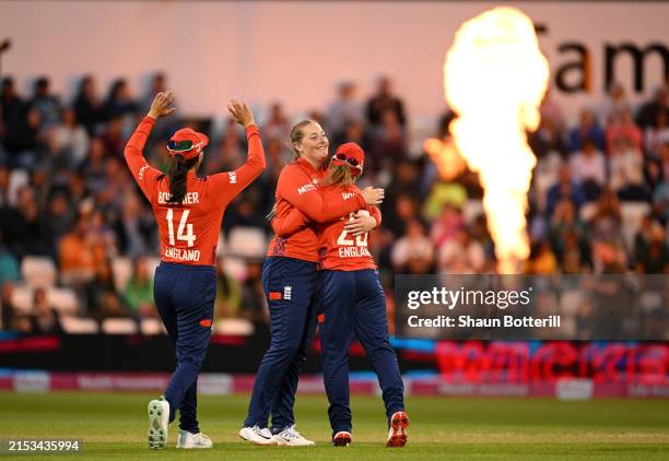 Sophie Ecclestone of England celebrates with teammate Danielle Wyatt after taking a wicket during the 2nd Women's Vitality IT20 match between England...