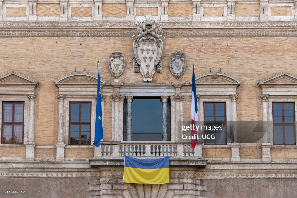 Facade of the French embassy besides the French and European Union flags, in solidarity it also has the Ukrainian one. Piazza Farnese Square, Rome, Italy, Europe, European Union, EU