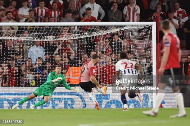 Alex Palmer of West Bromwich Albion fails to save a penalty from Adam Armstrong of Southampton which results in the third goal for Southampton during...
